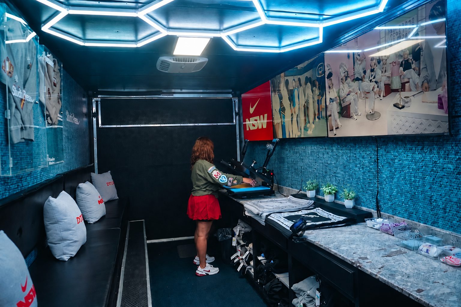 Nike × DTLR HBCU Tour — live heat-press activation on the Nike trailer