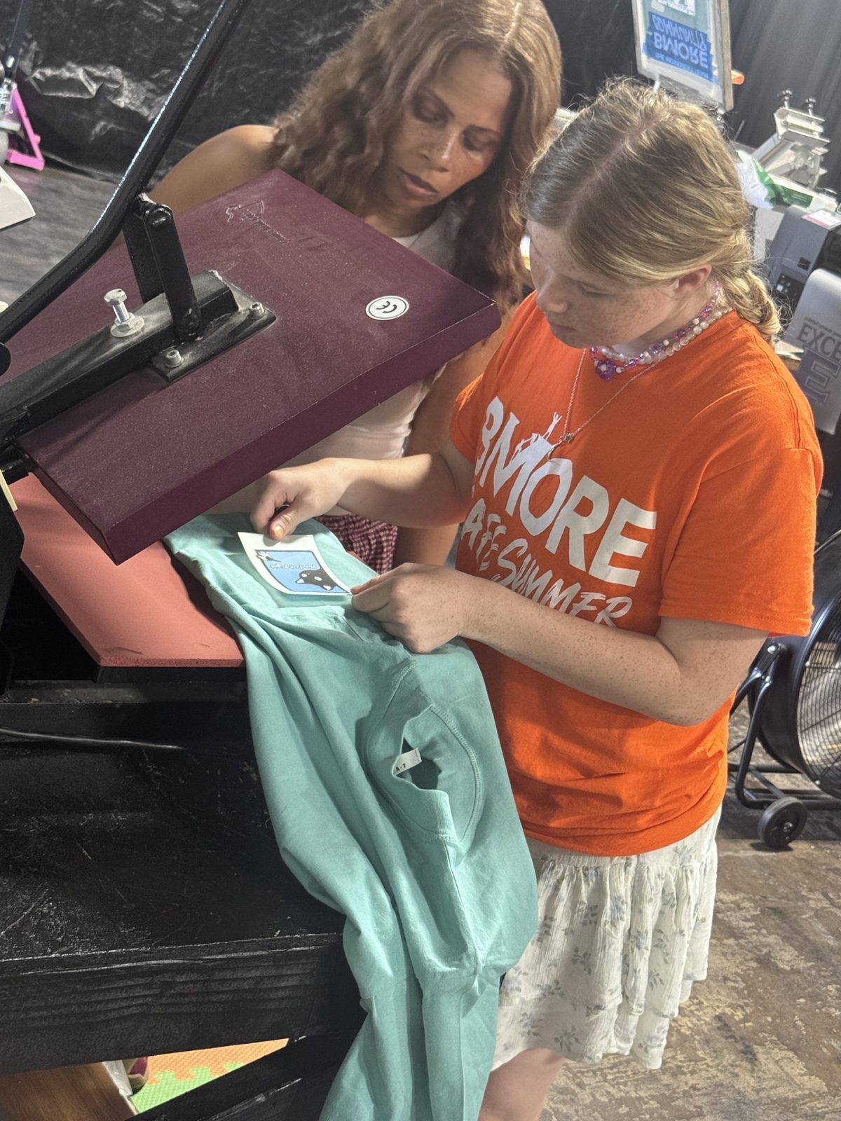 Student print program — on the heat press